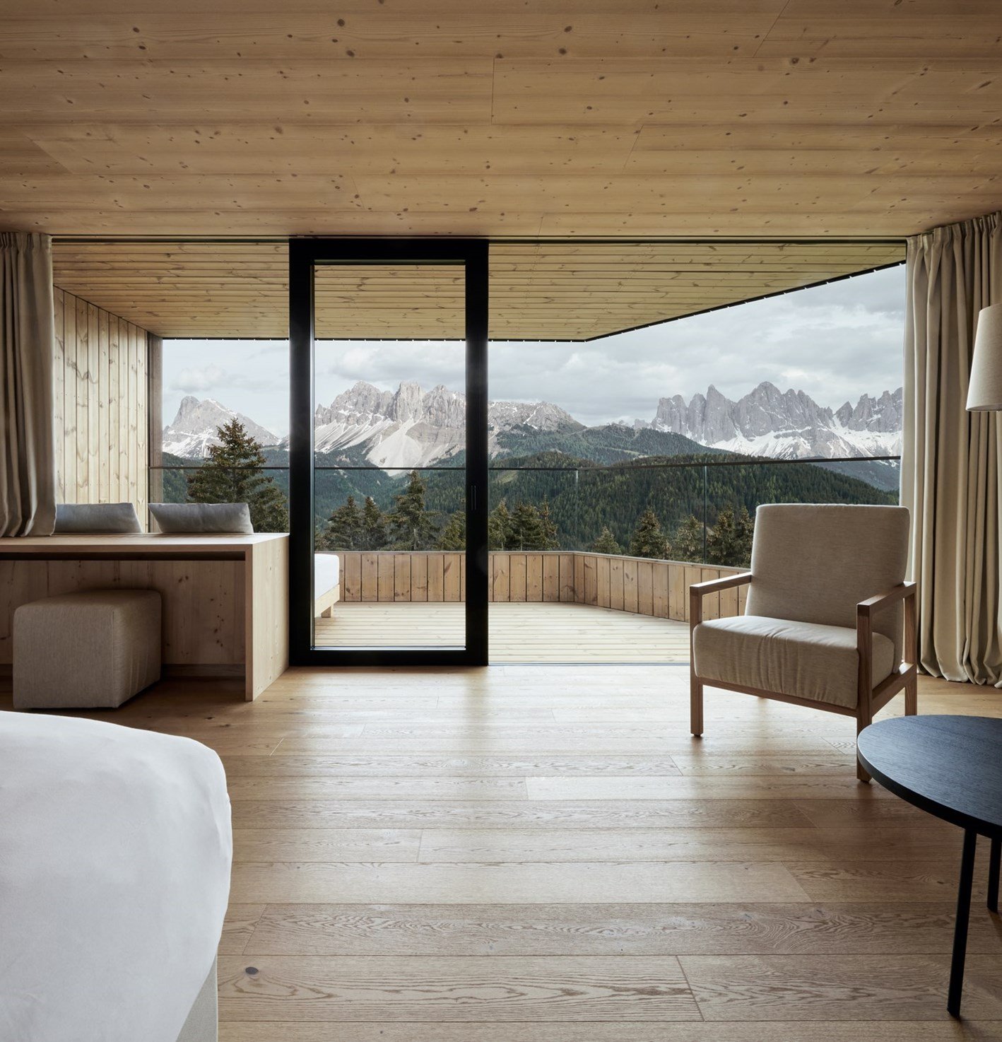 luxury minimalist bedroom at forestis in the dolomites